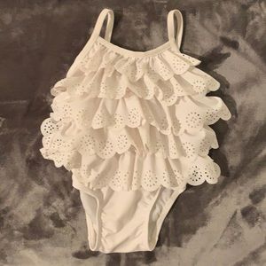 Beautiful white scalloped swimsuit.